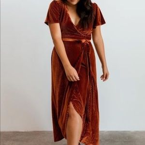 Gorgeous Copper Velvet Ribbed wrap dress from Baltic Born. Size Medium.